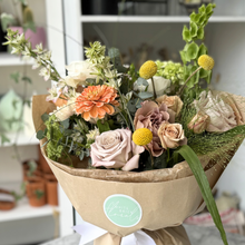 Load image into Gallery viewer, soft + muted hand tied bouquet in kraft paper